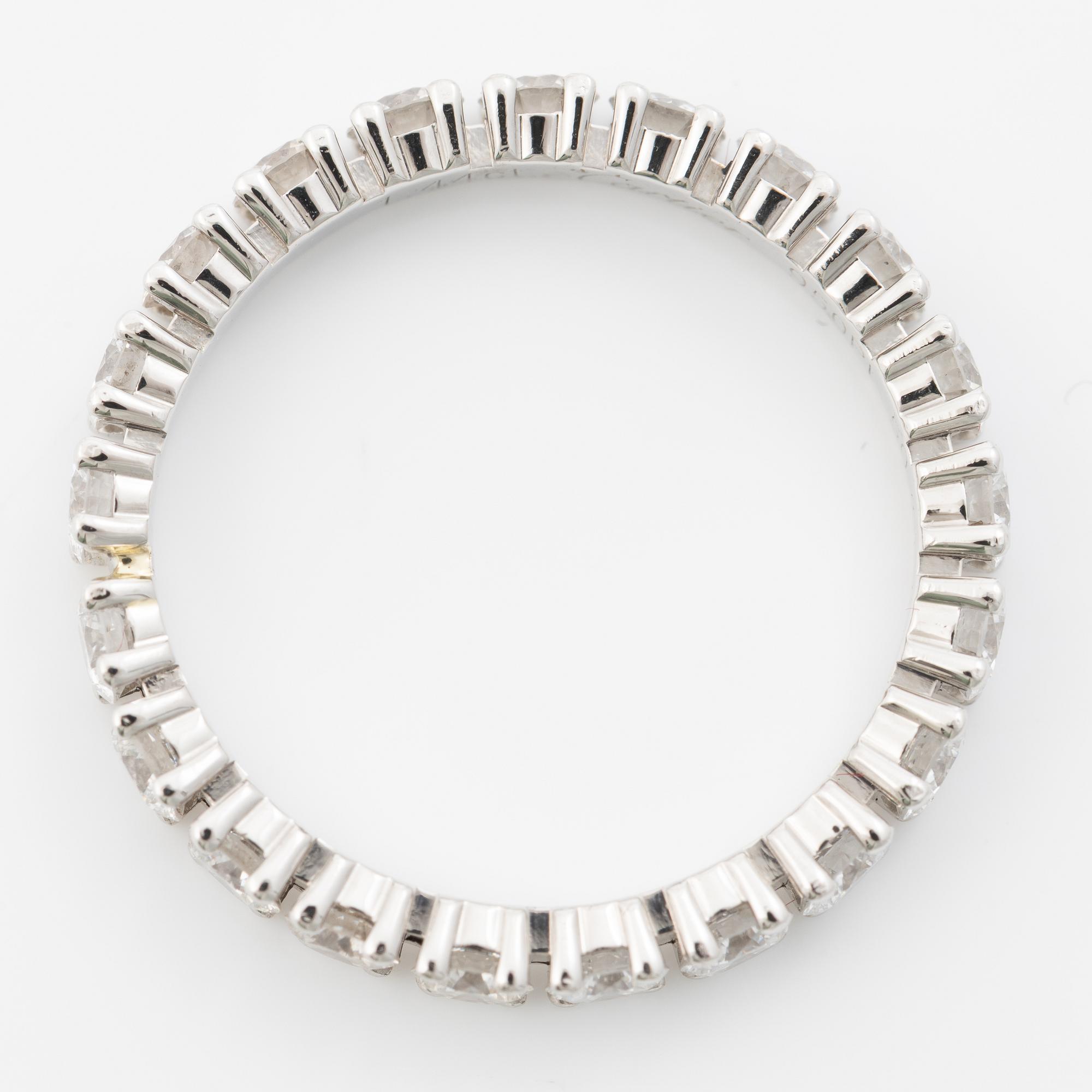 Ring, Cartier, helallians platina med briljantslipade diamanter.