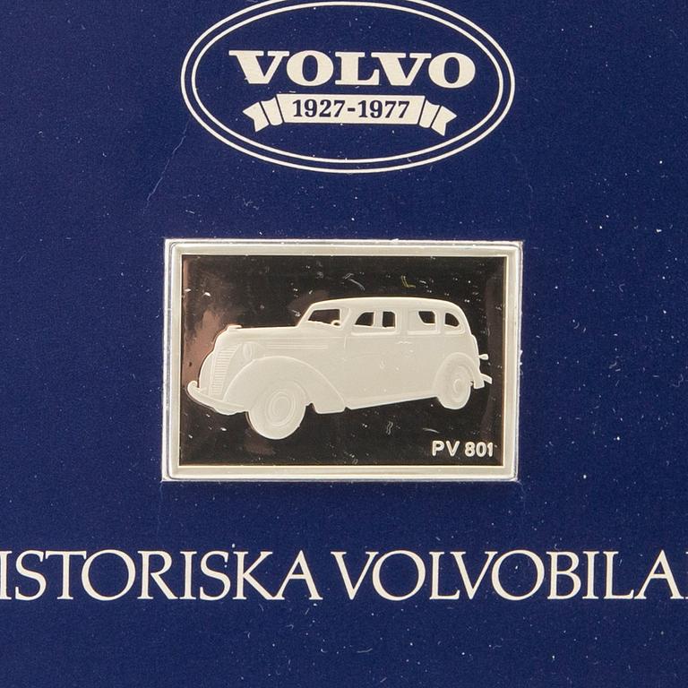 Twelve silver plaques with Volvo cars by Franklin Mint 1978.