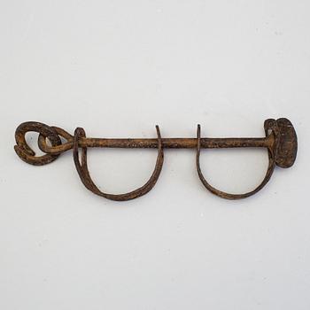 A pair of 1700s wrought handcuffs.