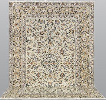 A carpet, Keshan, approx. 322 x 218 cm.