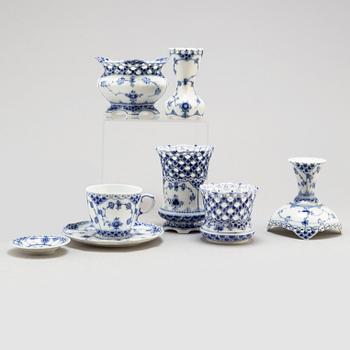 a 23 part porcelain service 'Musselmalet' by Royal Copenhagen.