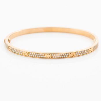 A Cartier bangle "Love" 18K rose gold with round brilliant-cut diamonds.