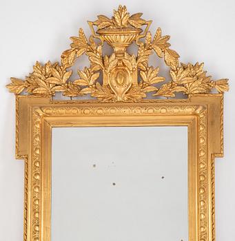 A mirror and console table from around the year 1900.