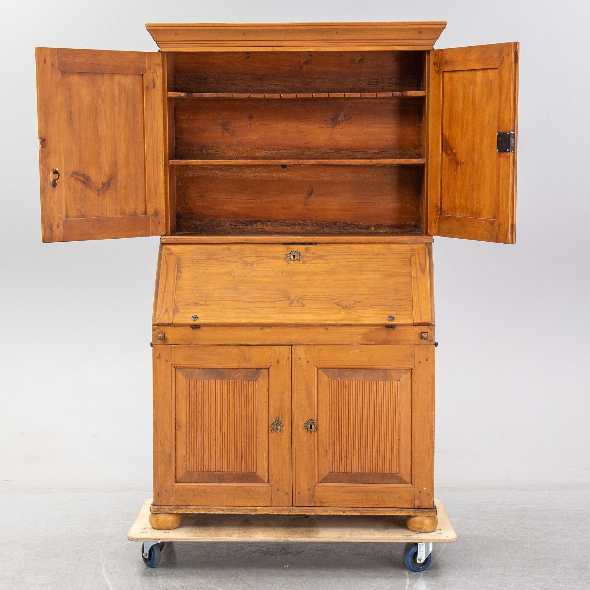 A pine cabinet, circa 1800.