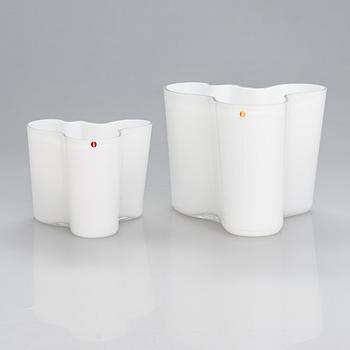 Alvar Aalto, two glass vases, the smaller one Iittala 100th Anniversary vase marked Alvar Aalto Iittala 1881-1981.