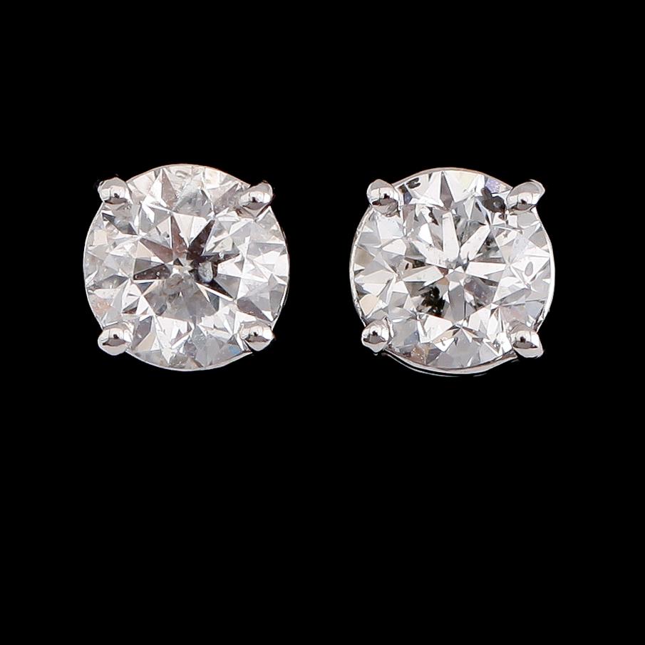 ÖRHÄNGEN, 1 par, 18 k vitguld, solitära briljantslipade diamanter tot ca 1.86 ct.