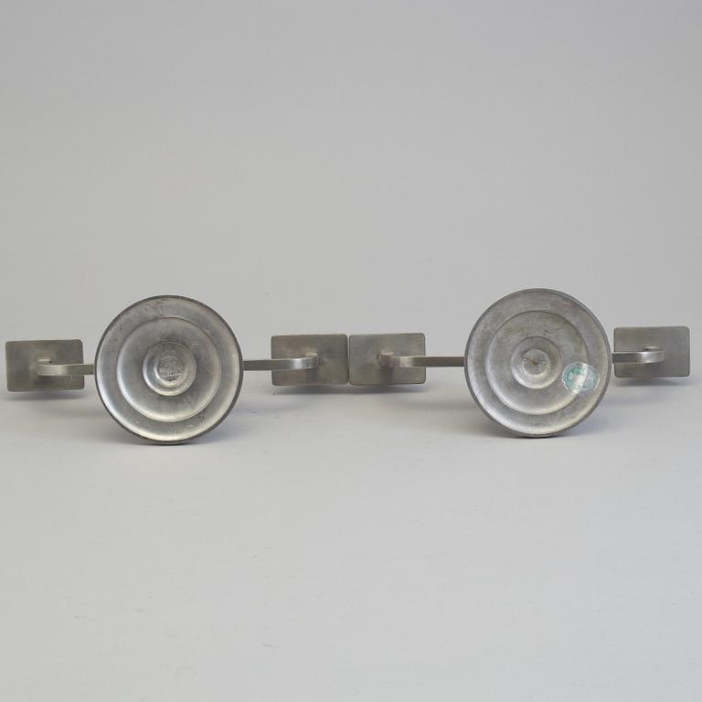 GAB, a pair of pewter candelabra, 1936-7.