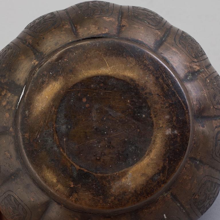 A Chinese engraved bronze hand warmer, late Qing dynasty,