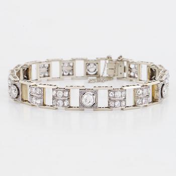 An 18K white gold bracelet set with old- and rose-cut diamonds.