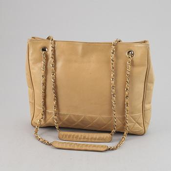Chanel, a beige leather handbag, 1986-1988.