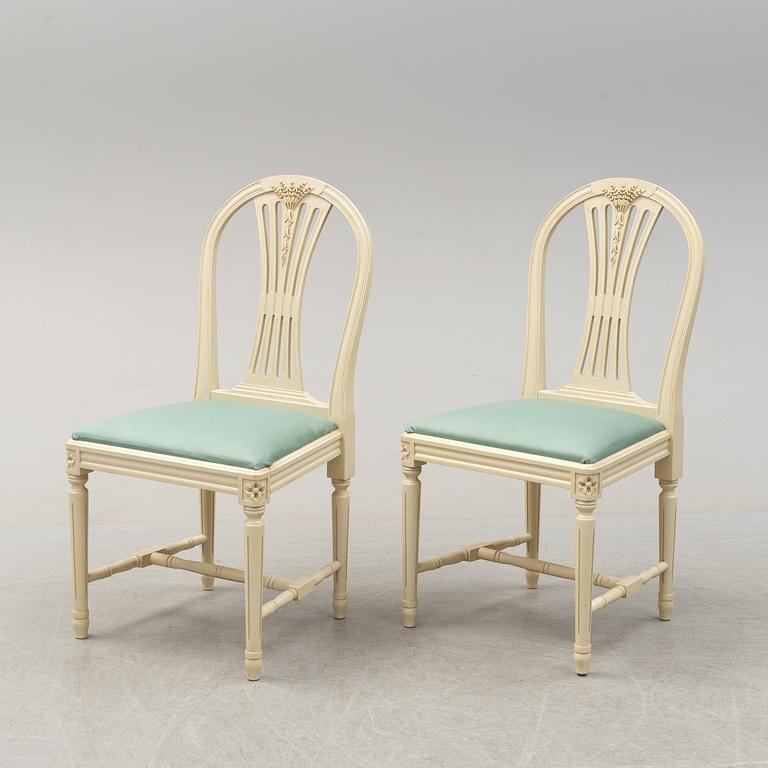 A set of six chairs and a dining table, gustavian style, late 20th century.
