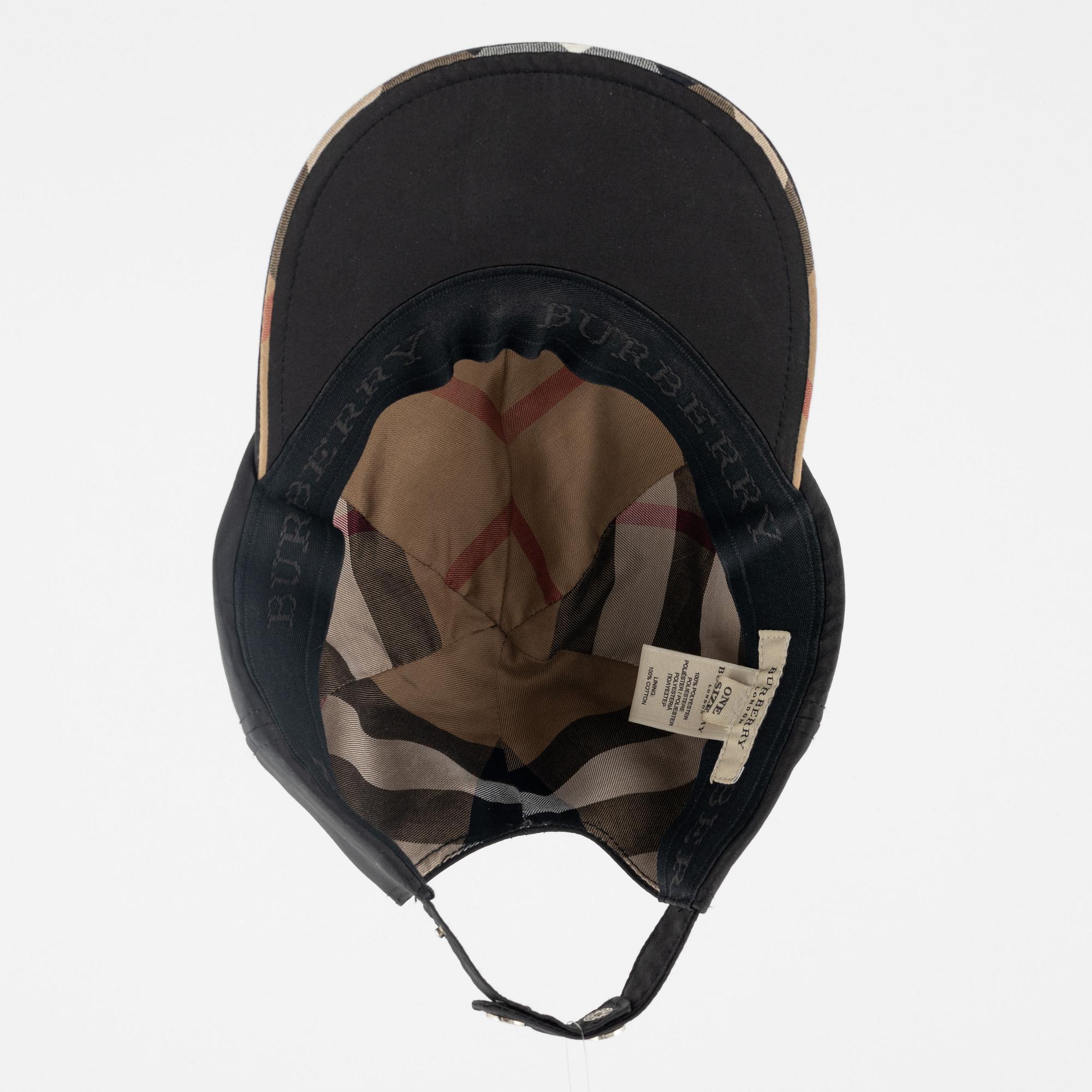 Burberry, väska, solskärm samt keps.