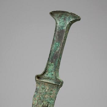 A Luristan bronze sword.