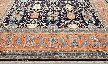 A Heris carpet, approx. 480 x 341 cm.