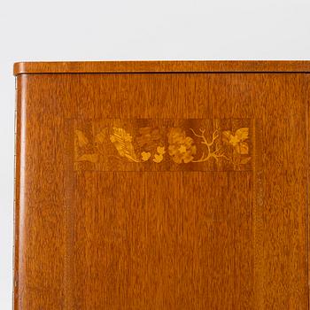 A Swedish Modern cabinet, 1940s.