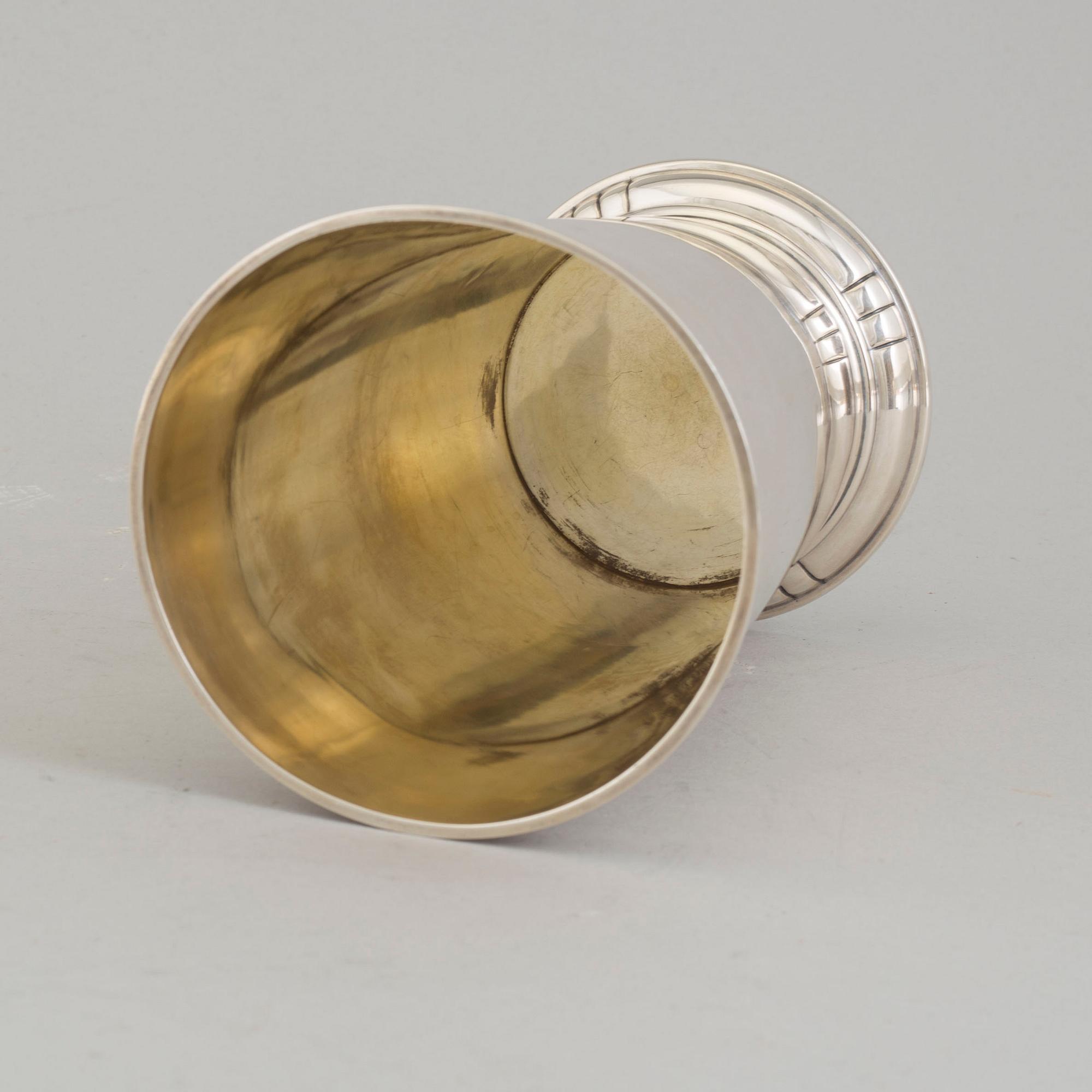 A parcel-gilt sterling silver vase from Aktiebolaget Ikora, Stockholm, 1953.
