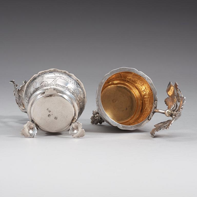 A pair of German 18th century parcel gilt jelly-pots, marks of  Johann Christoph Seelingslow, Magdeburg.