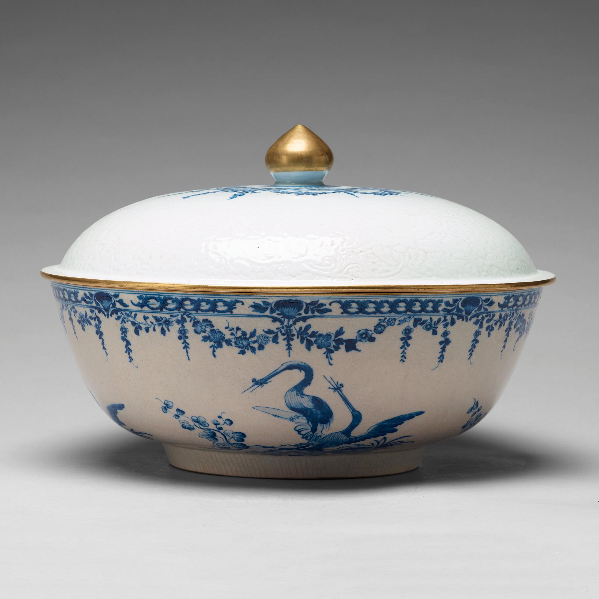 A large blue and white armorial punch bowl with cover, Qing dynasty, Qianlong (1736-95).