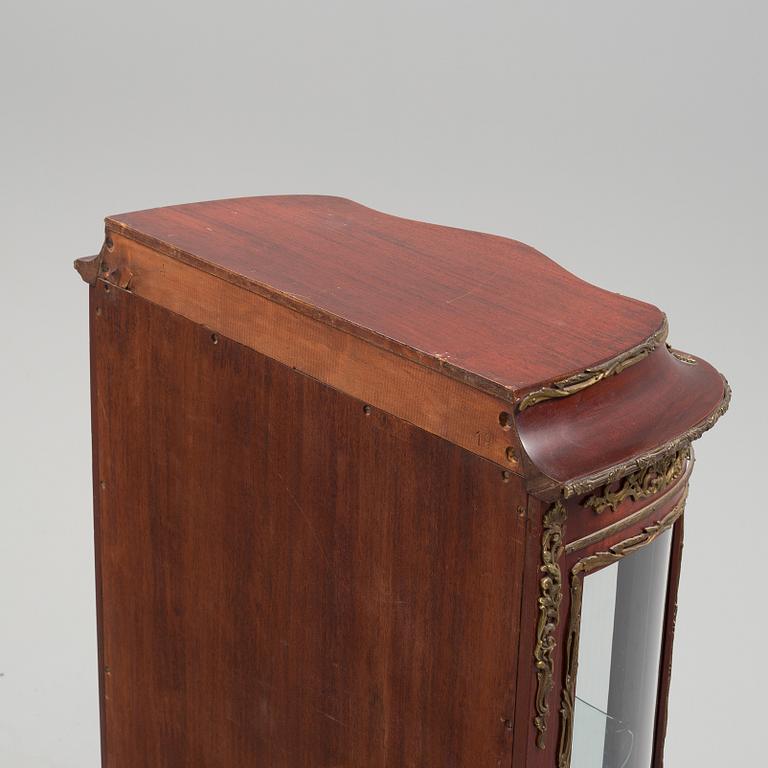 A Louis XV style cabinet, first half of the 20th century.