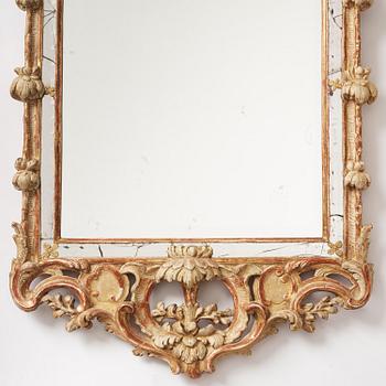 A Swedish rococo giltwood mirror attributed to N. Sundström (master in Stockholm 1754-81).