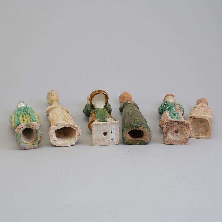 Eight earthenware figures, Ming dynasty.