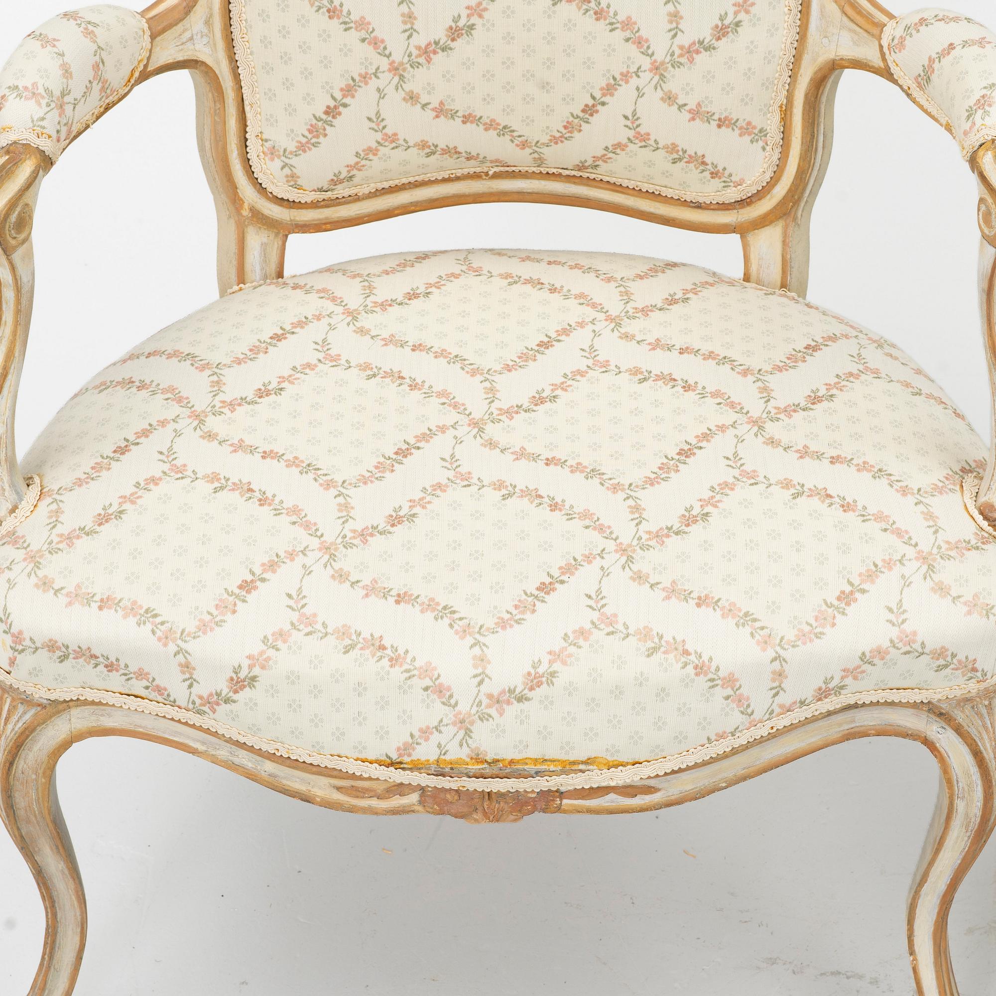 A matched pair of Rococo armchairs, 18th Century.