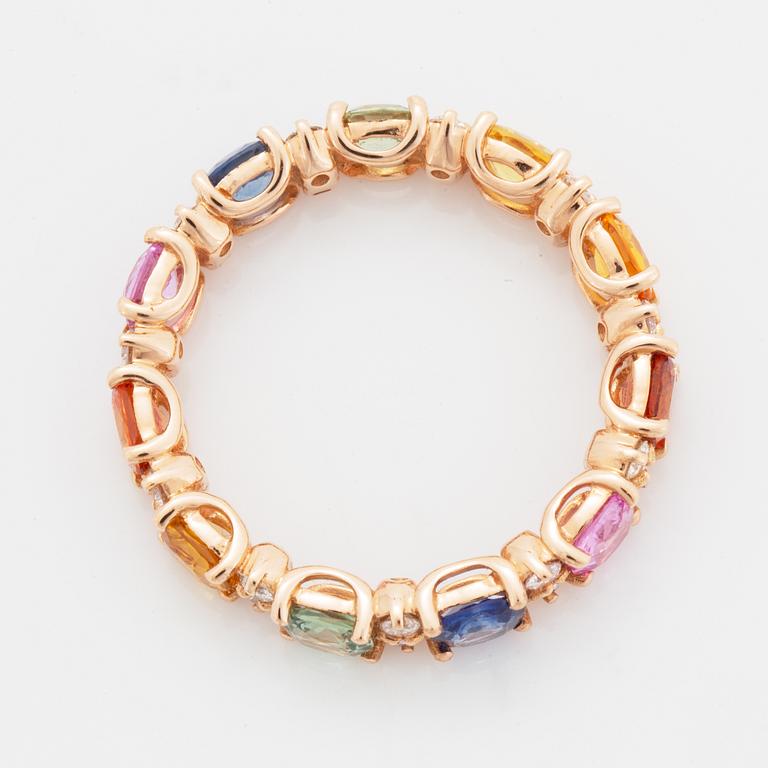 Multi coloured sapphire and diamond ring.