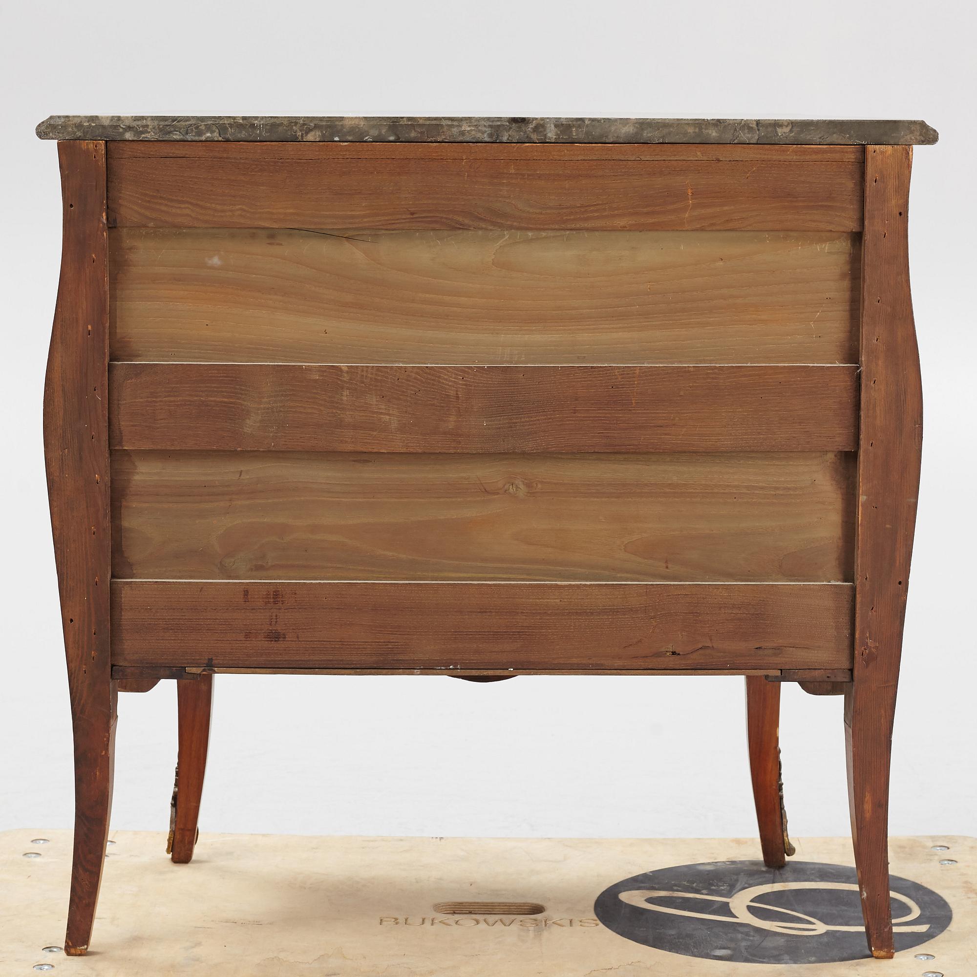 A Louis XV-style marquetry commode, first part of the 20th century.