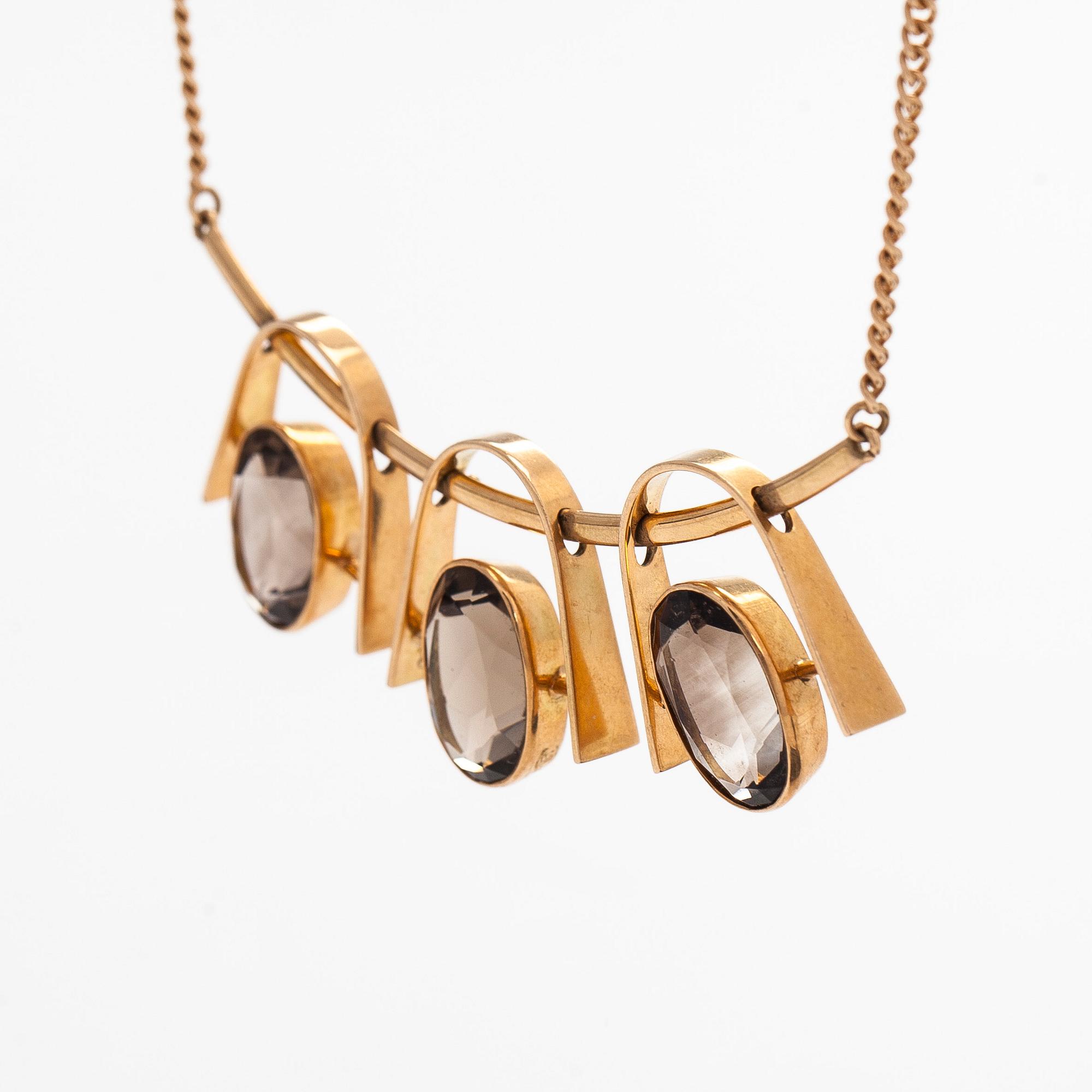 Eero Rislakki, halssmycke, fasettslipade rökkvartser, 14K guld. Westerback, 1960.