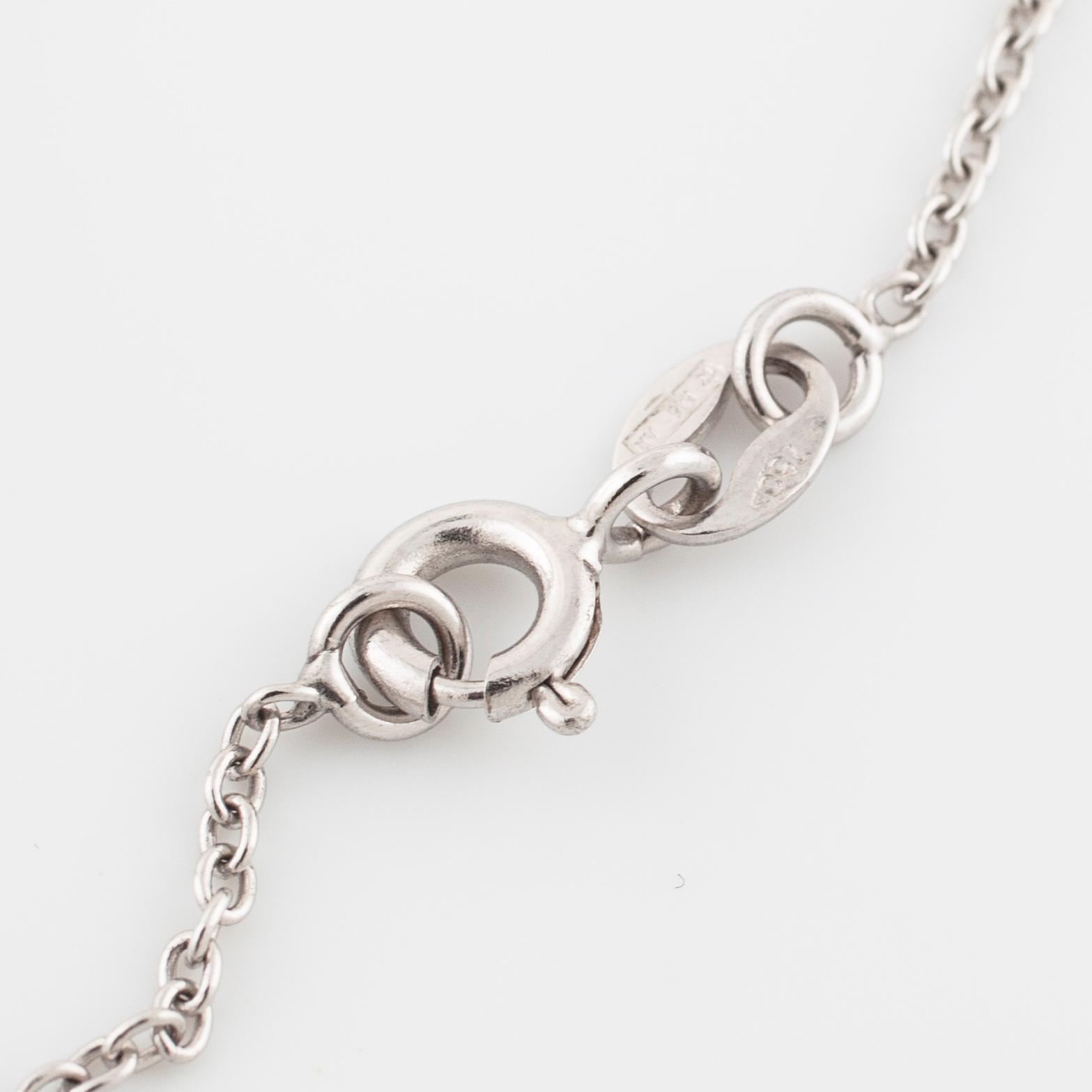 COLLIER/BROSCH, med rosen- och gammalslipade diamanter.