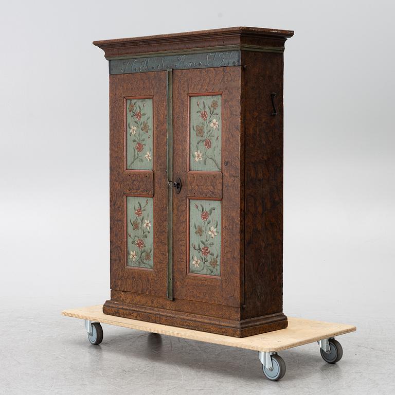 A Swedish painted cabinet,  marked 1797.