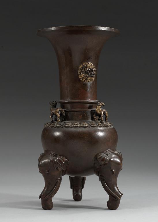 A gilt bronze vase, Qing dynasty with Xuandes six character mark.