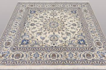 A rug, Nain part silk, ca 197 x 197 cm.