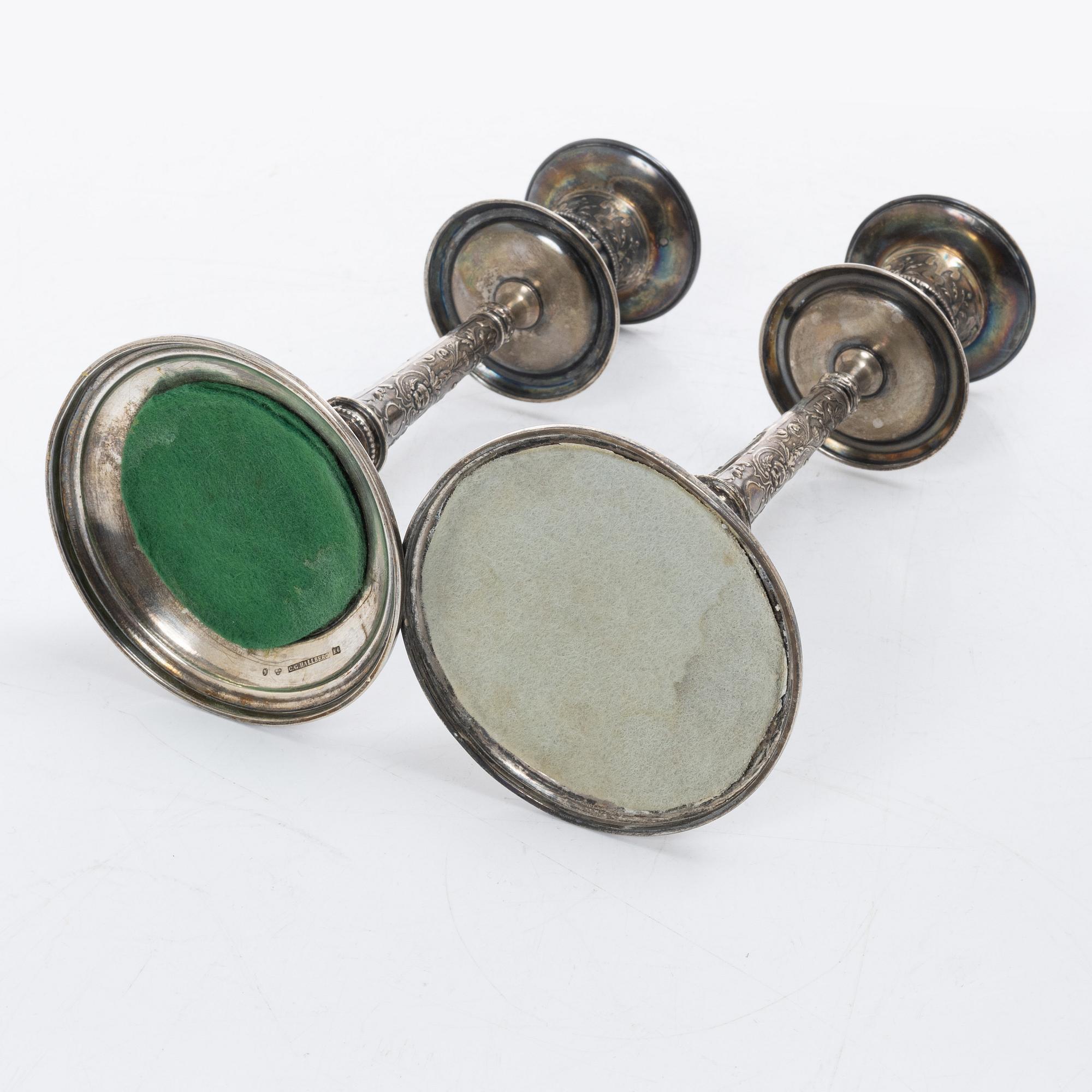 A pair of Swedish silver Renaissance-revival candlesticks, mark of CG Hallberg, Stockholm 1883.