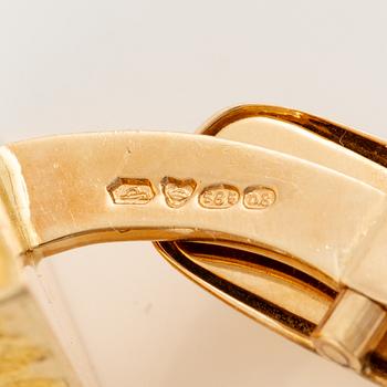 A pair of cufflinks 14K gold.