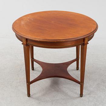 An Empire style table, a sofa and eight chairs, early 20th Century.