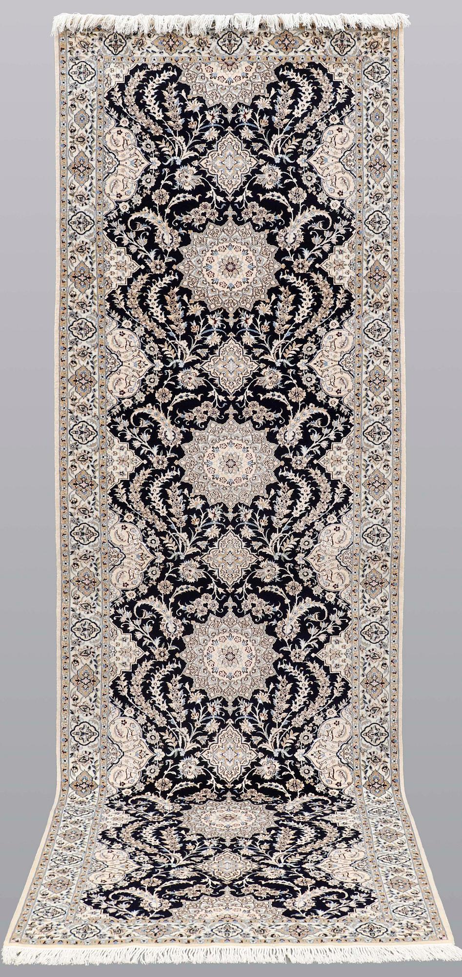 A Nain runner carpet, part silk Sk 6LAA, 337 x 103 cm.
