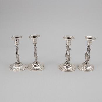 A Swedish 19th century matched set of four silver candlesticks, mark of Johan Petter Grönvall, Stockholm 1824.