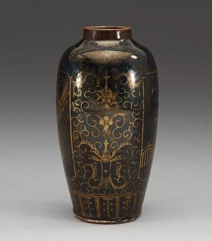 A gilt black vase, Qing dynasty, 18th Century, with Kangxis six character mark.