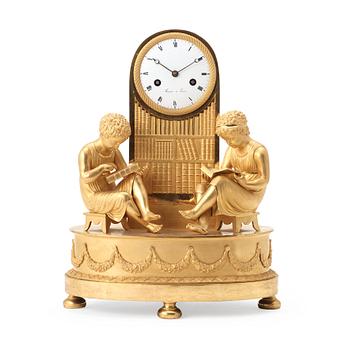 A French Empire early 19th century gilt bronze mantel clock.