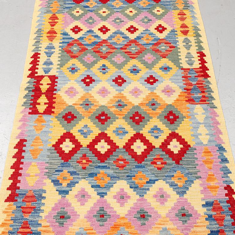 A runner, kilim 300 x 88 cm.