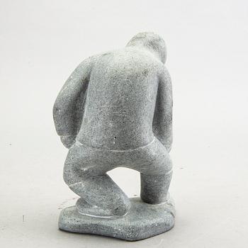 A simon Kristofferson signed stone figurine.