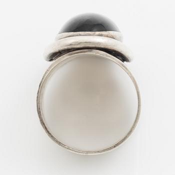 Ring, Carl Ove Frydensberg, silver with cabochon-cut black stone, Denmark.