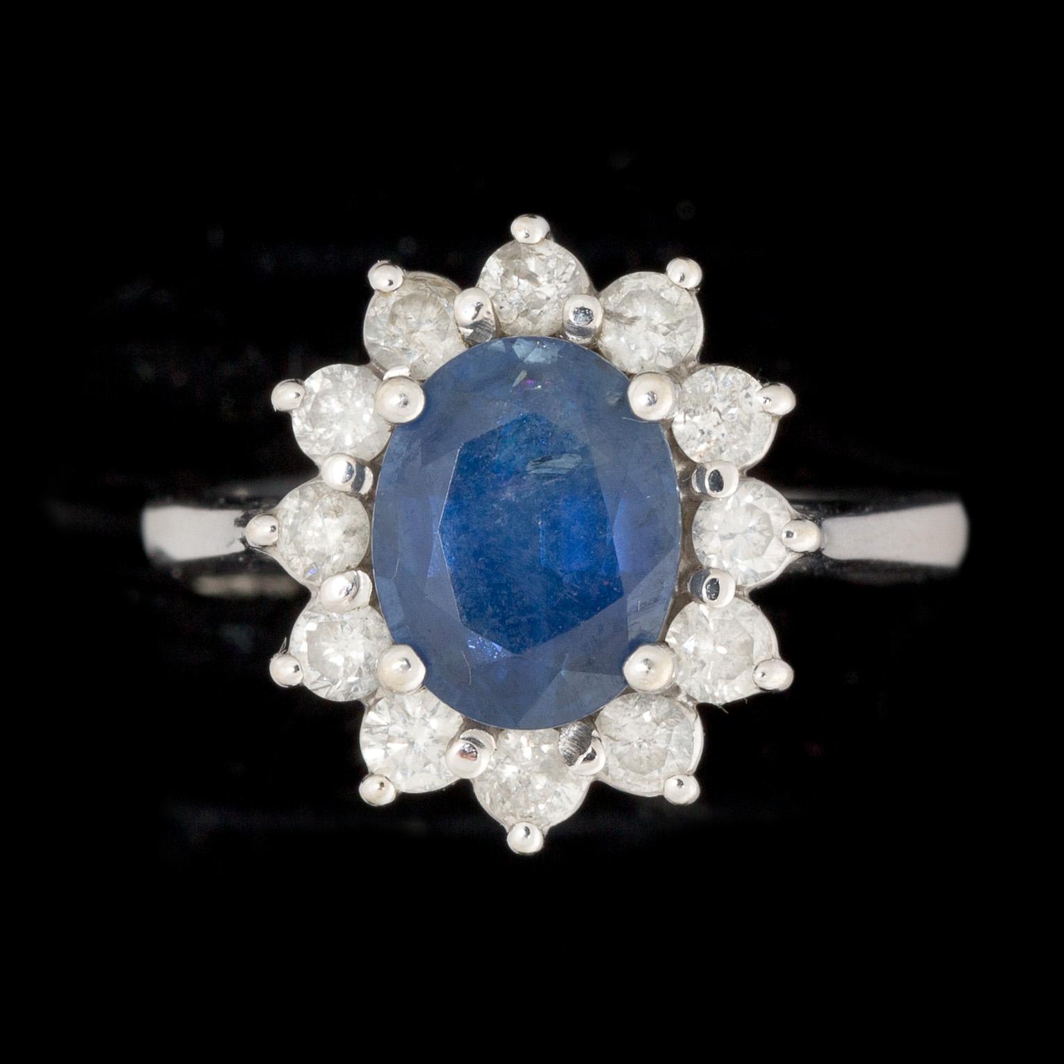RING, 14k vitguld, safir, gammalslipade diamanter, ca 0.60ct. Vikt ca 4g.