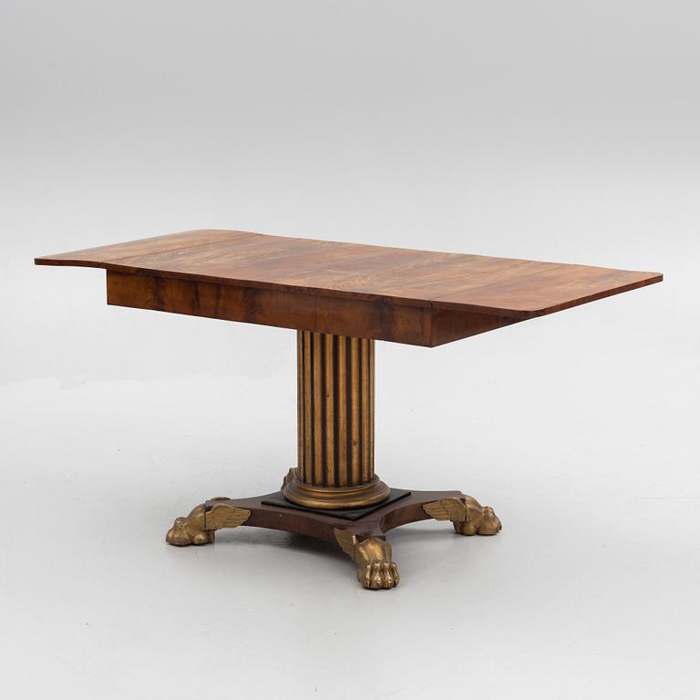 An Empire table, first half of the 19th Century.