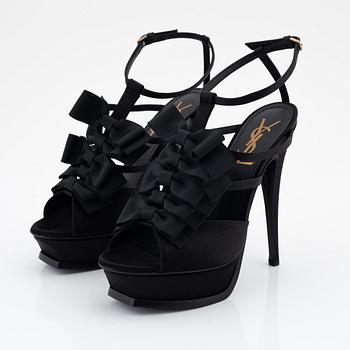 Yves Saint Laurent, a pair of black silk and bows platform sandals, size 37.