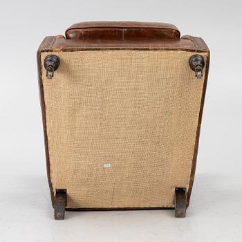 An armchair, contemporary.