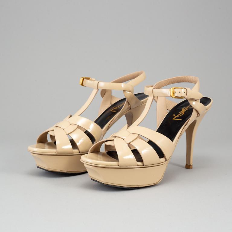 YVES SAINT LAURENT, a pair of open toe patent leather shoes, size 36½.