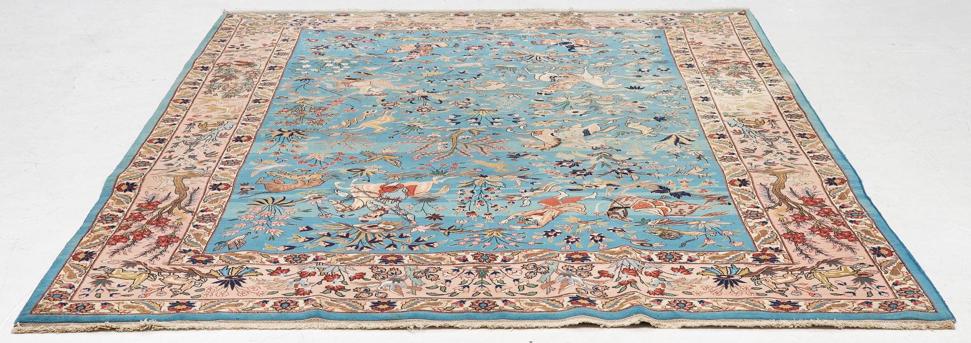 A Tabriz carpet of 'Hunting' design, northwest persia, c. 290 x 200 cm.