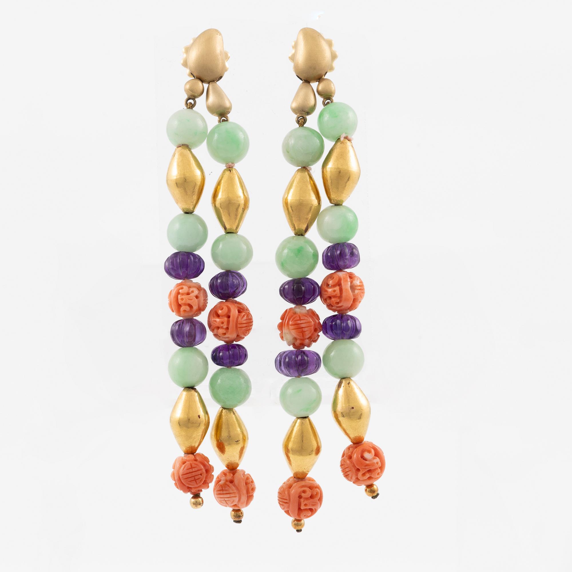 A pair of earrings in 18K gold with various coloured gemstones.
